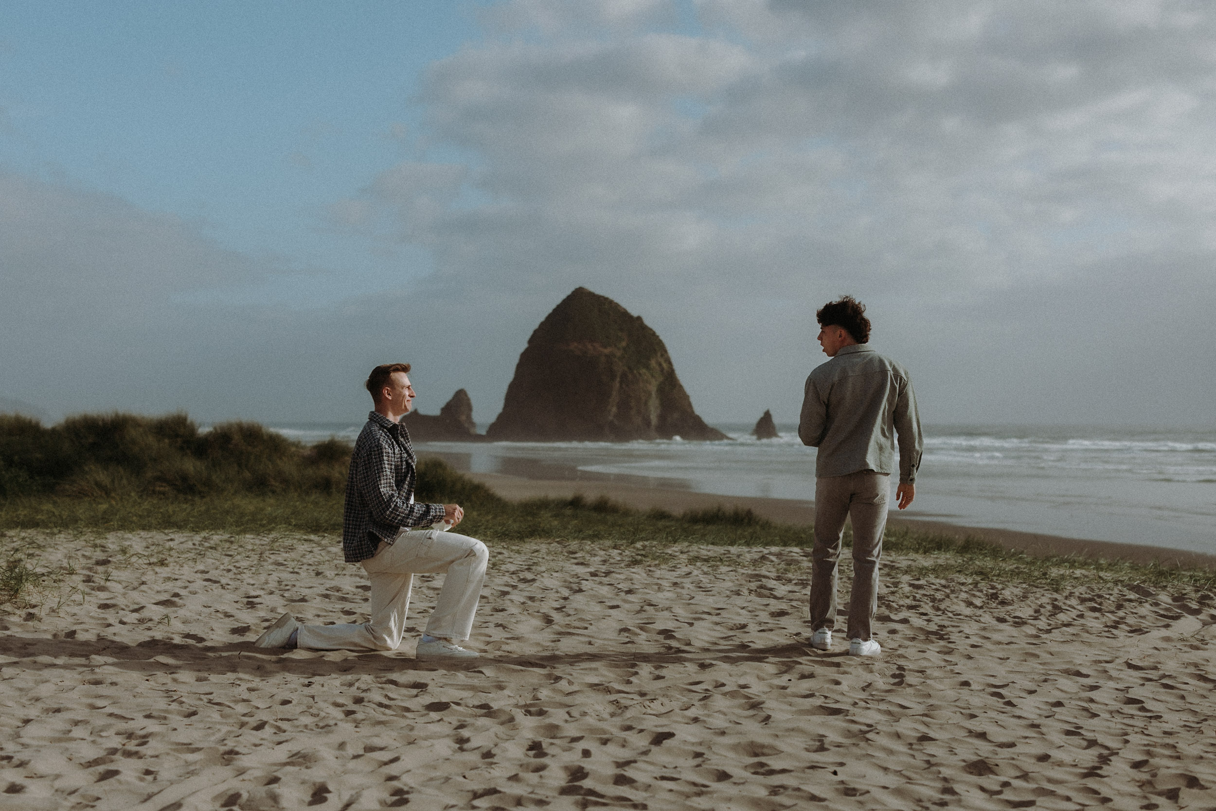 A gay proposal engagement at Cannon Beach, Oregon.